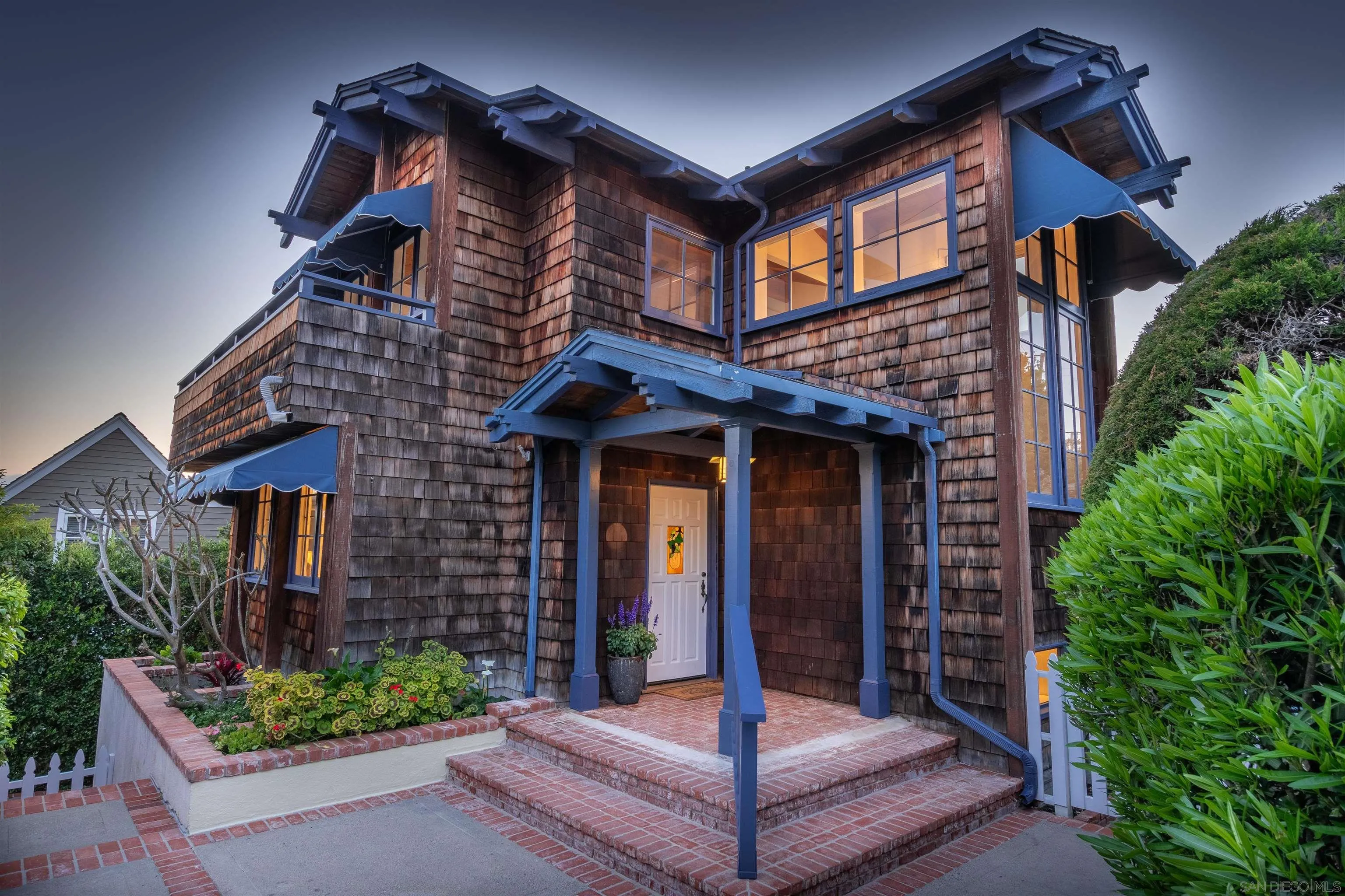 1041 Temple Terrace Laguna Beach, CA 92651 - Photo 37 of 43 a front view of a house with garden