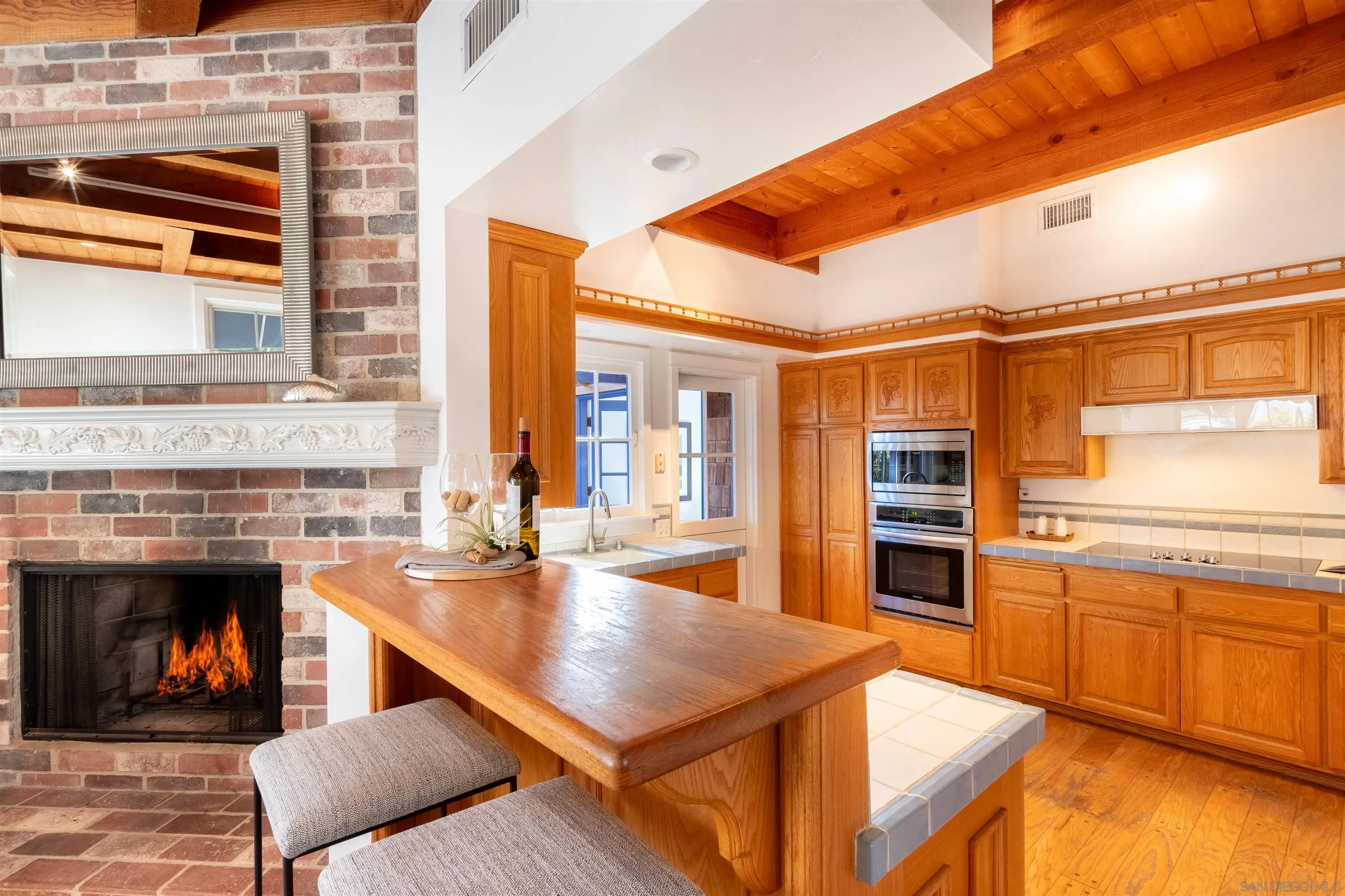 1041 Temple Terrace Laguna Beach, CA 92651 - Photo 10 of 43 a kitchen with stainless steel appliances a stove and a refrigerator