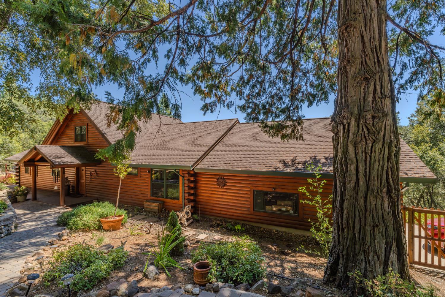 25804 Aspen Court Volcano, CA 95689 - Photo 1 of 1 FRONT ELEVATION WITH LANDSCAPED FENCED YARD.