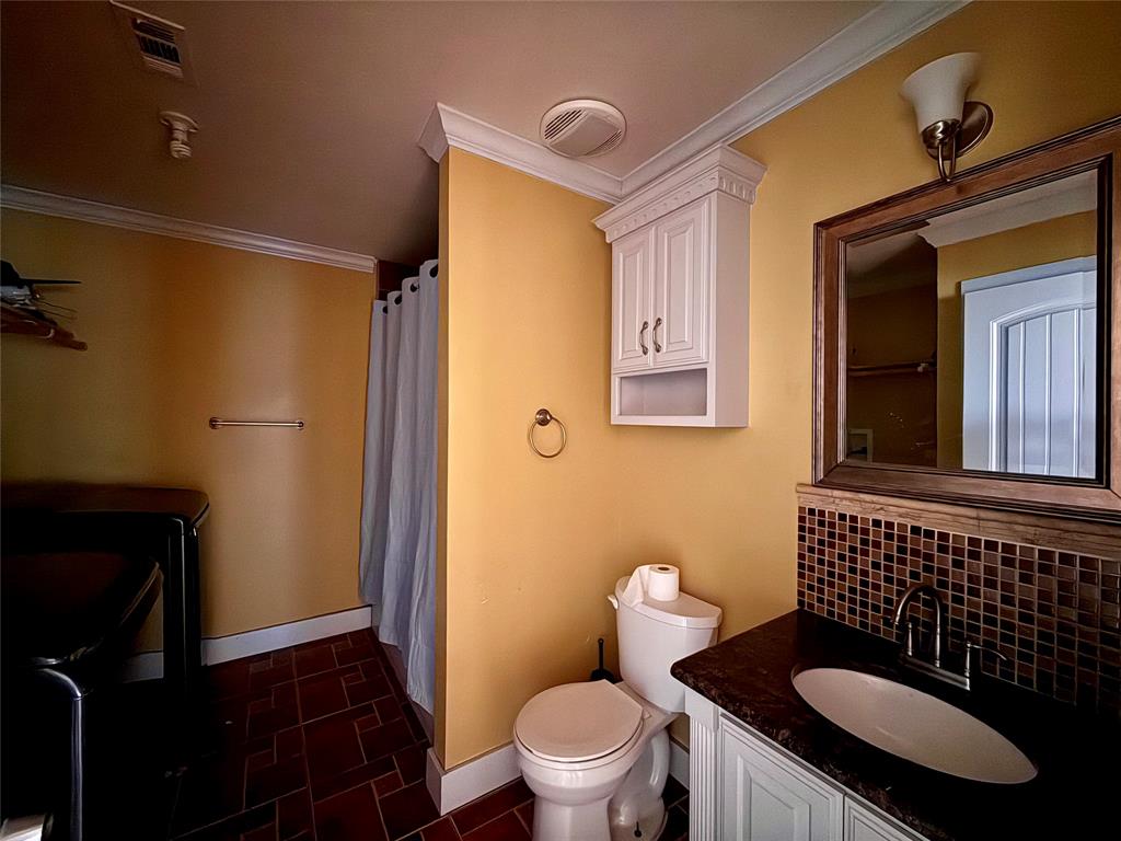 487 County Road 2622 Decatur, TX 76234 - Photo 15 of 20 a bathroom with a sink and a mirror