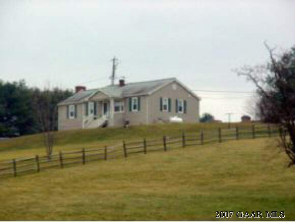 114 Indian Ridge Road Greenville, VA 24440 - Photo 1 of 1 a front view of a house with a yard