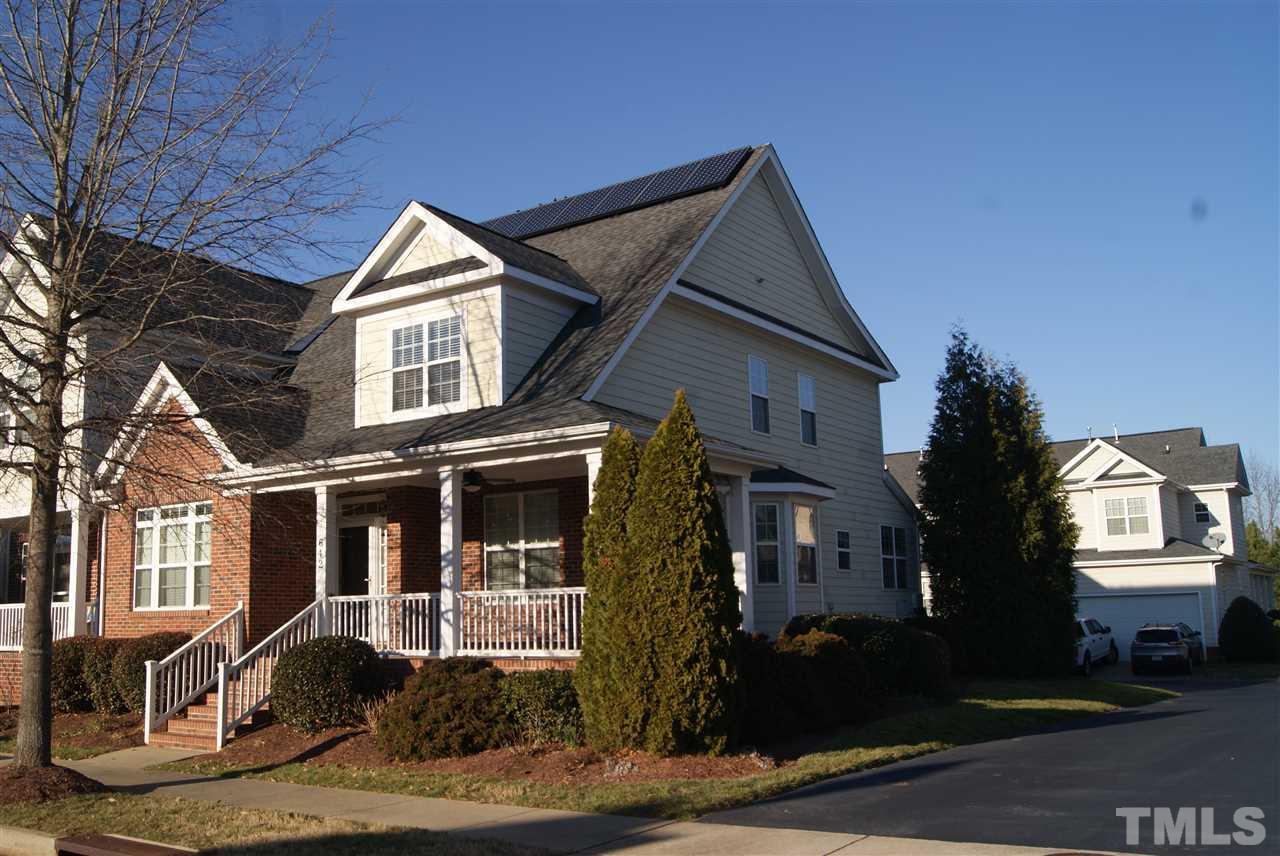 642 Democracy Street Raleigh, NC 27603 - Photo 1 of 25 a front view of a house with a yard