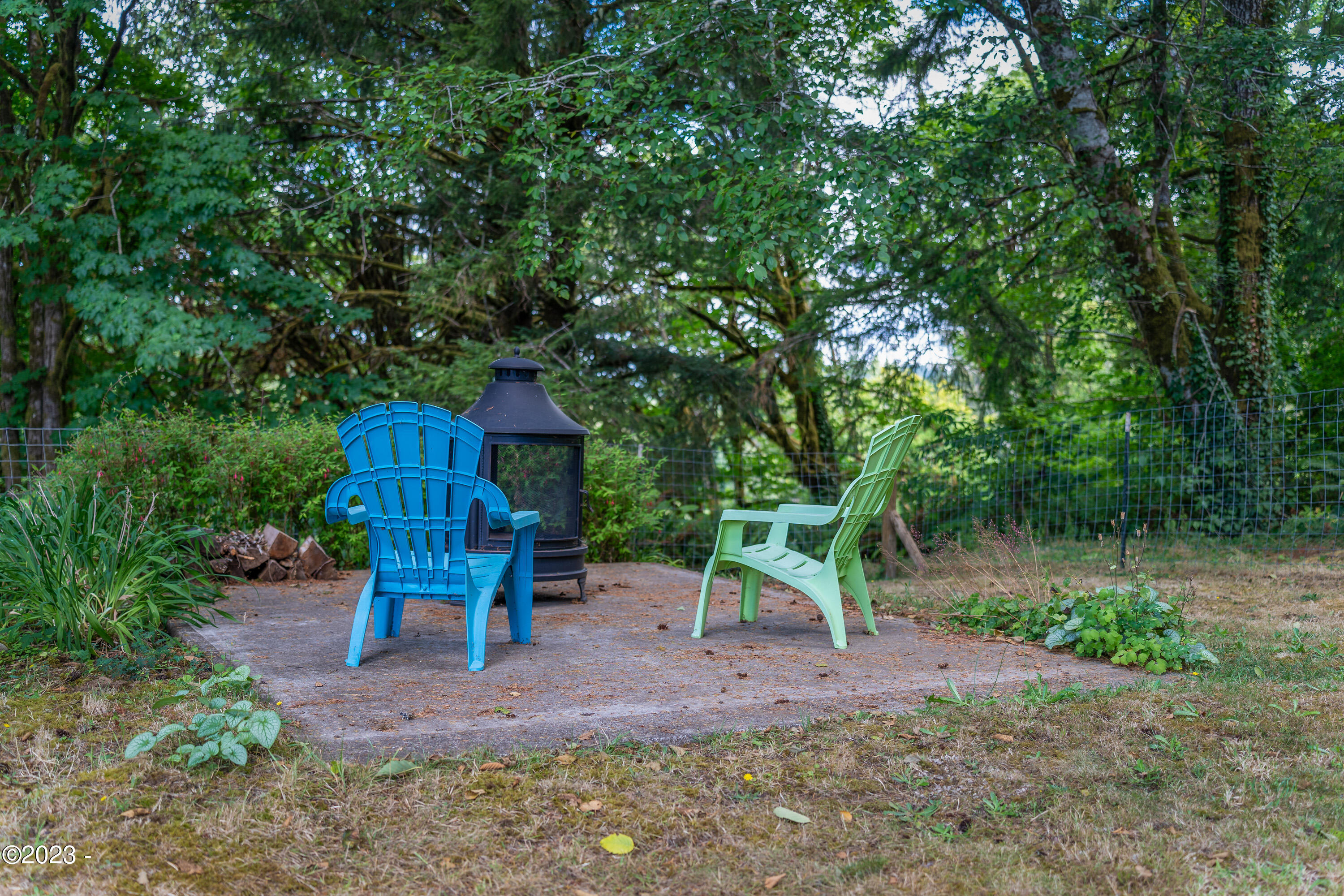 320 Old River Road Northeast Siletz, OR 97380 - Photo 44 of 45 Exterior Outdoor Fireplace