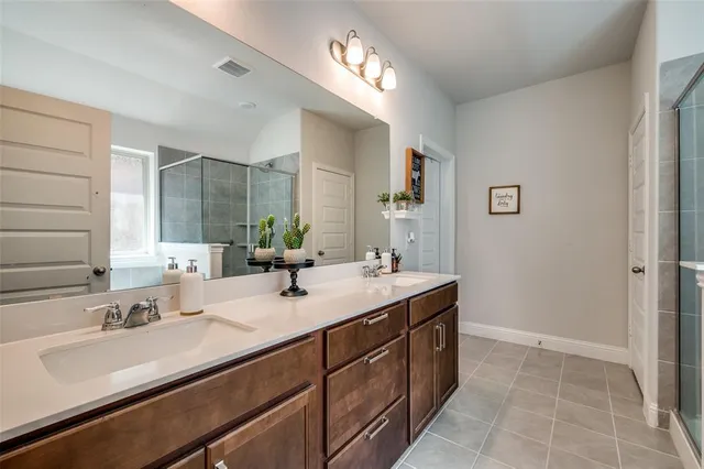 a bedroom with a bed and furniture