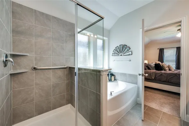 a bathroom with a sink double vanity and a mirror