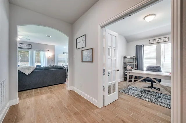 a living room with a couch and a table in it