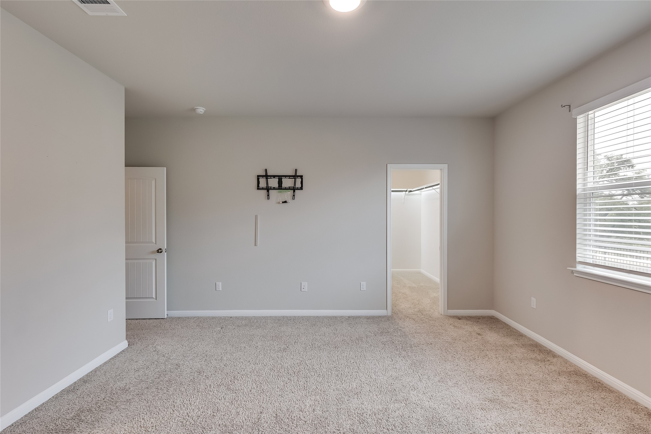 312 Empress Tree Drive Leander, TX 78641 - Photo 16 of 35 a view of an empty room with a window