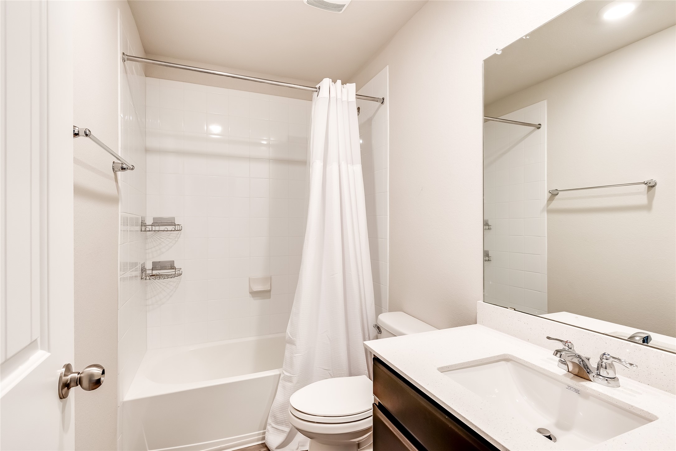 312 Empress Tree Drive Leander, TX 78641 - Photo 24 of 35 a bathroom with a sink a toilet and shower