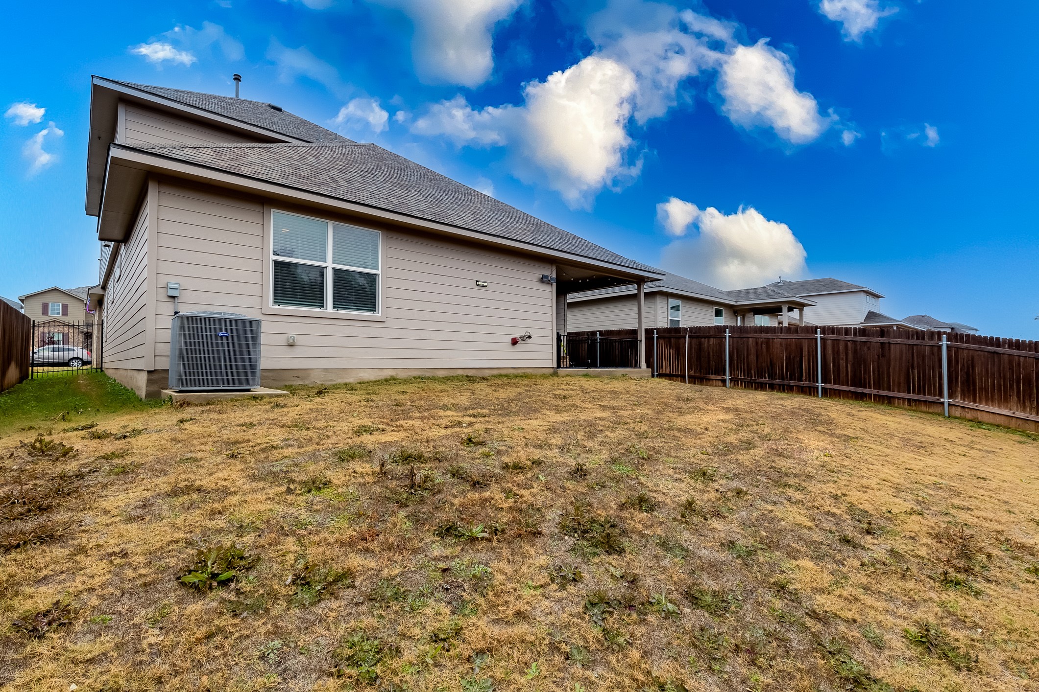 312 Empress Tree Drive Leander, TX 78641 - Photo 31 of 35 a house view with a backyard space