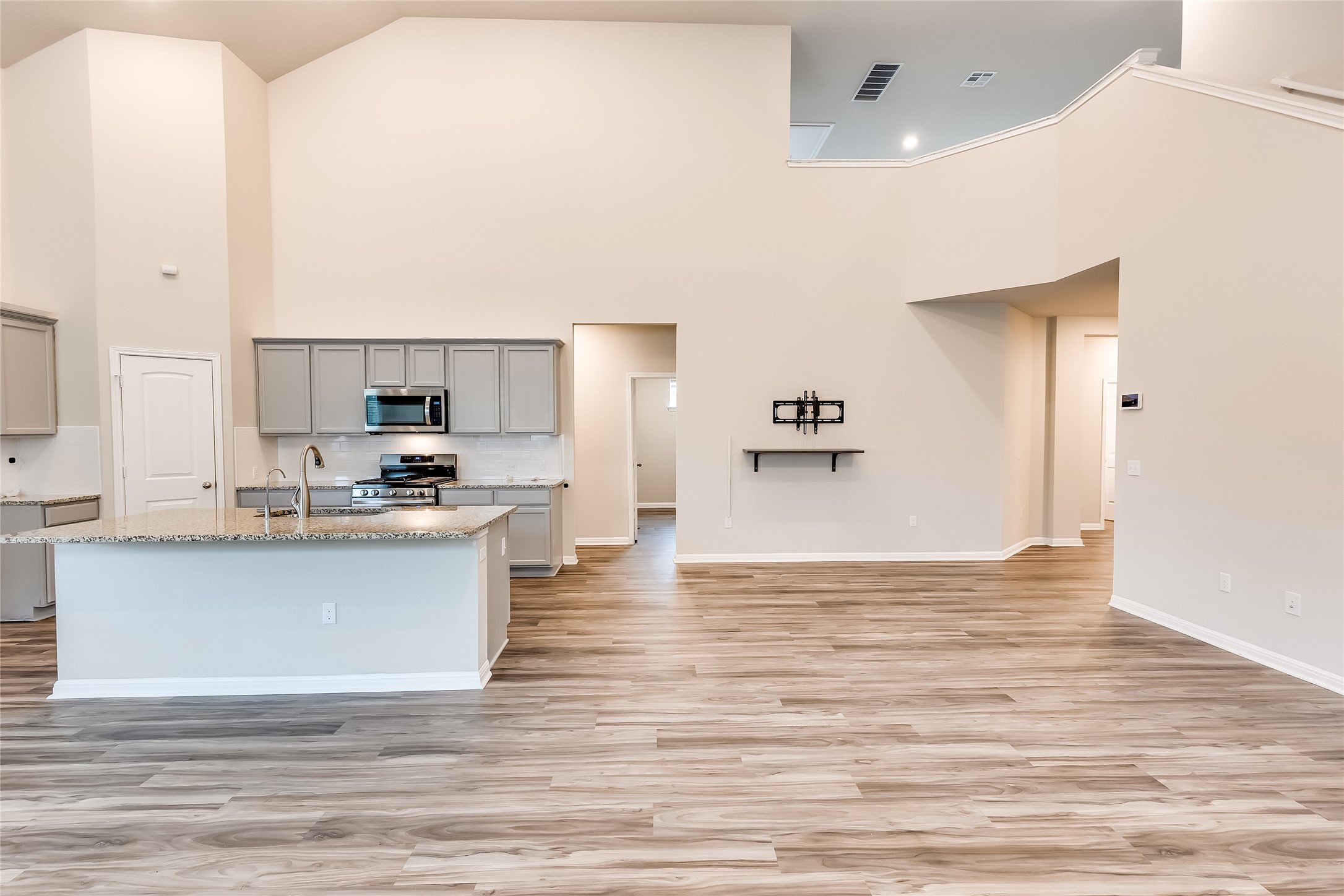 312 Empress Tree Drive Leander, TX 78641 - Photo 34 of 35 a view of kitchen with granite countertop cabinets and refrigerator