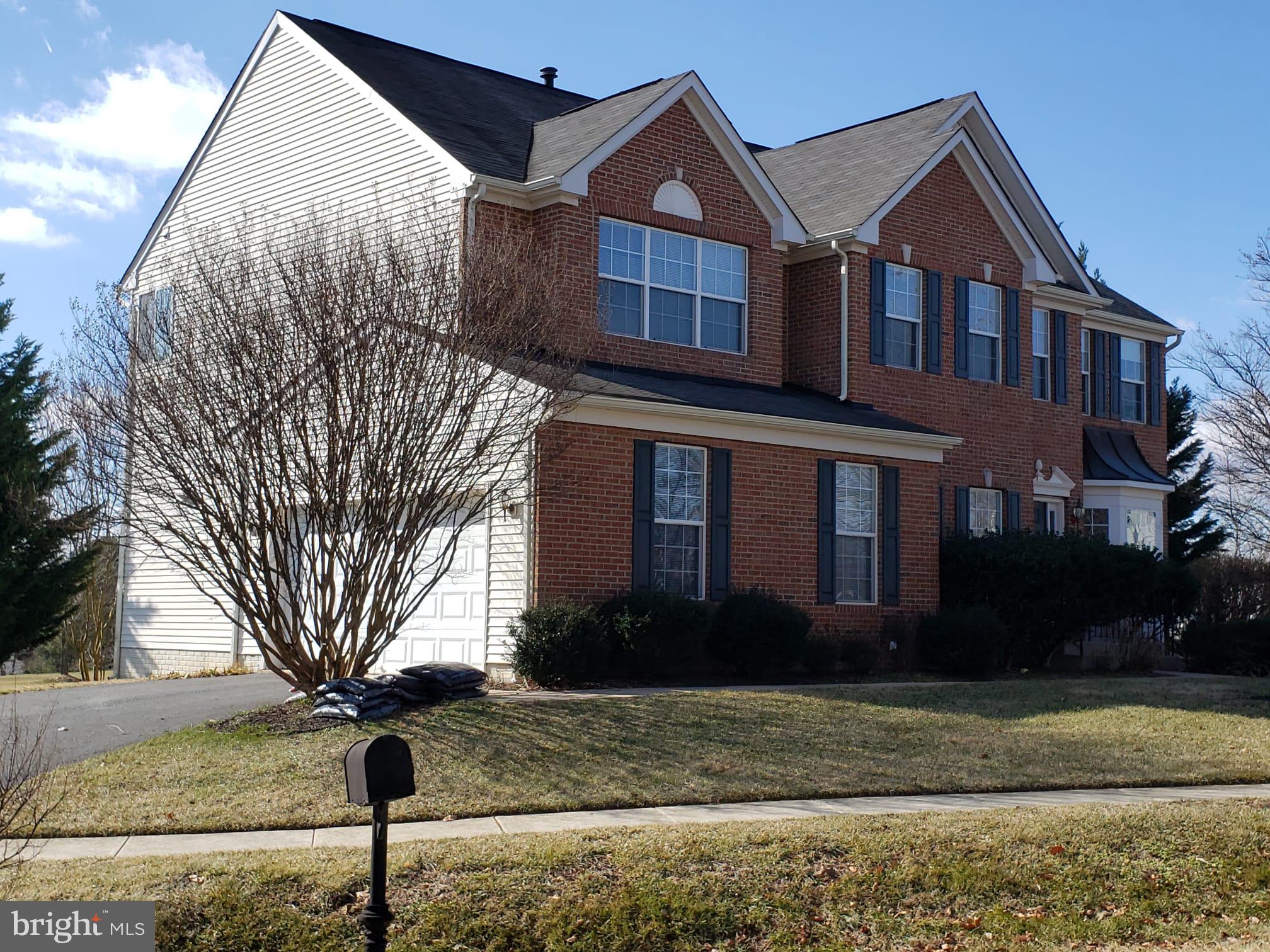 Front Exterior - Brick front with Bay Window