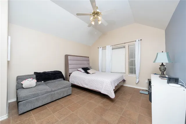 a view of a bedroom with natural light