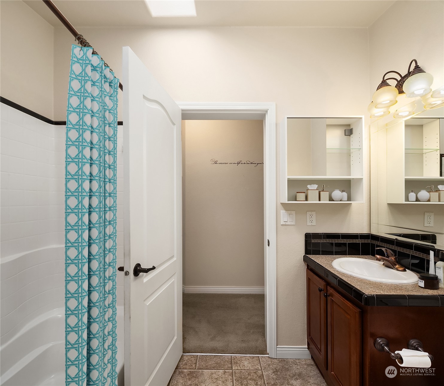 815 Southwest 124th Street, Unit 149 Everett, WA 98204 - Photo 15 of 35 a bathroom with a sink and a mirror