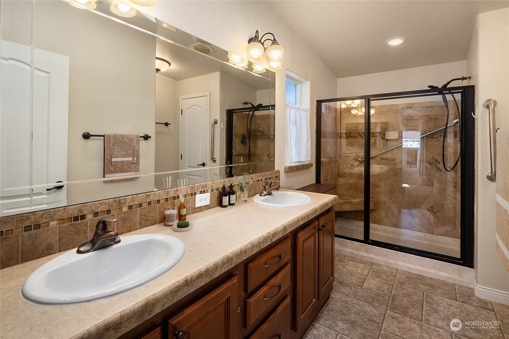815 Southwest 124th Street, Unit 149 Everett, WA 98204 - Photo 18 of 35 a bathroom with a sink double vanity and a mirror