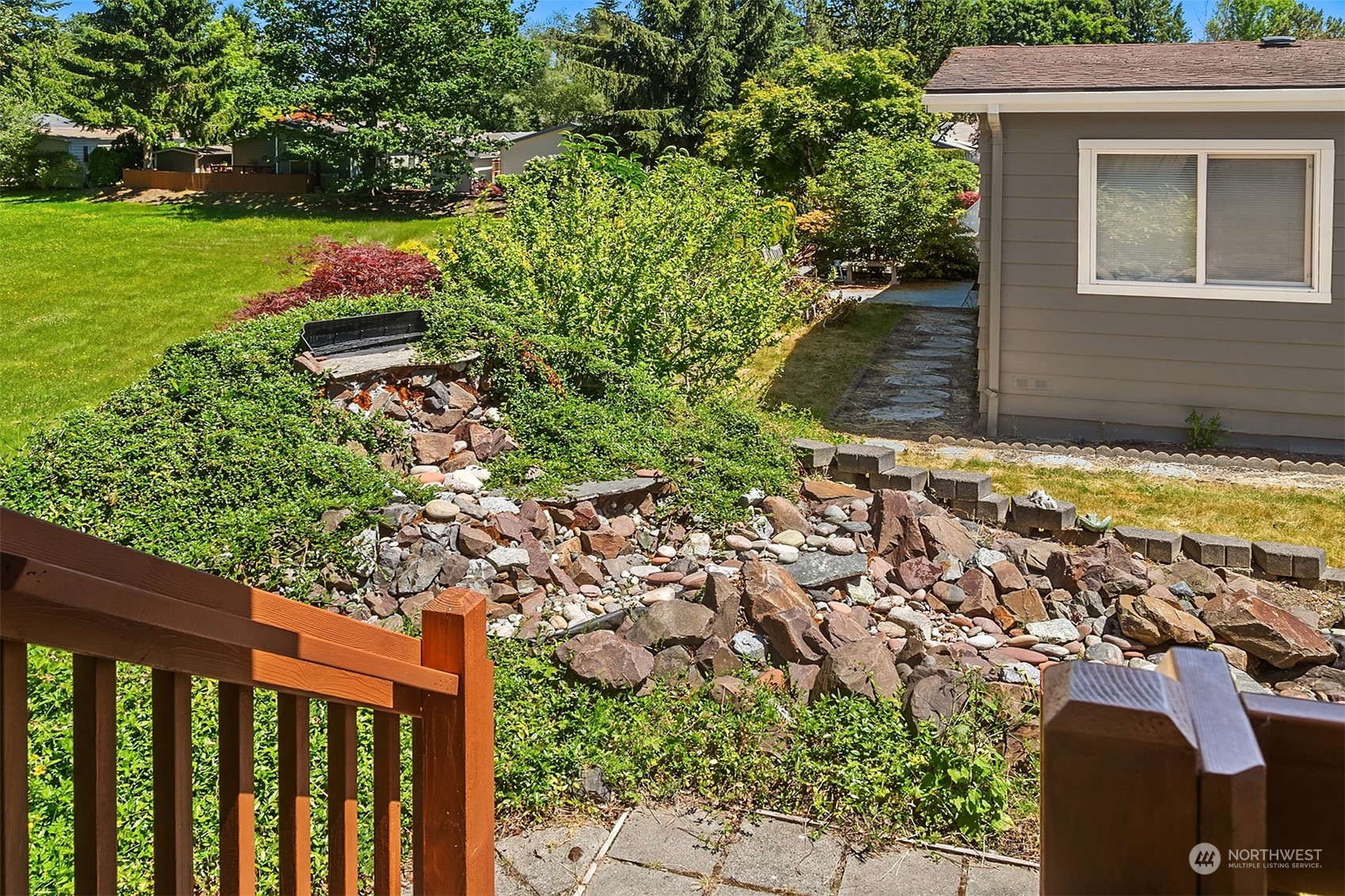 815 Southwest 124th Street, Unit 149 Everett, WA 98204 - Photo 23 of 35 a view of a backyard with potted plants