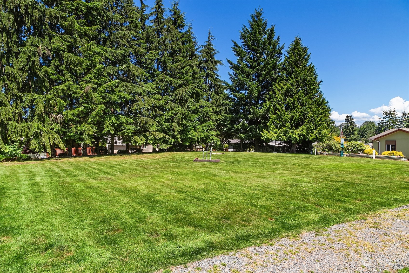 815 Southwest 124th Street, Unit 149 Everett, WA 98204 - Photo 26 of 35 a view of outdoor space with deck and yard