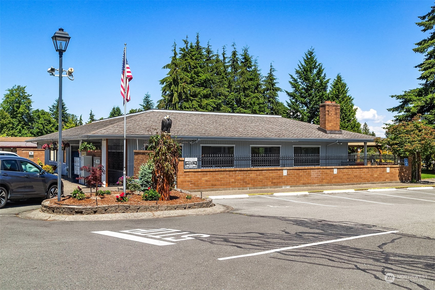 815 Southwest 124th Street, Unit 149 Everett, WA 98204 - Photo 30 of 35 a view of a house with outdoor space and sitting area