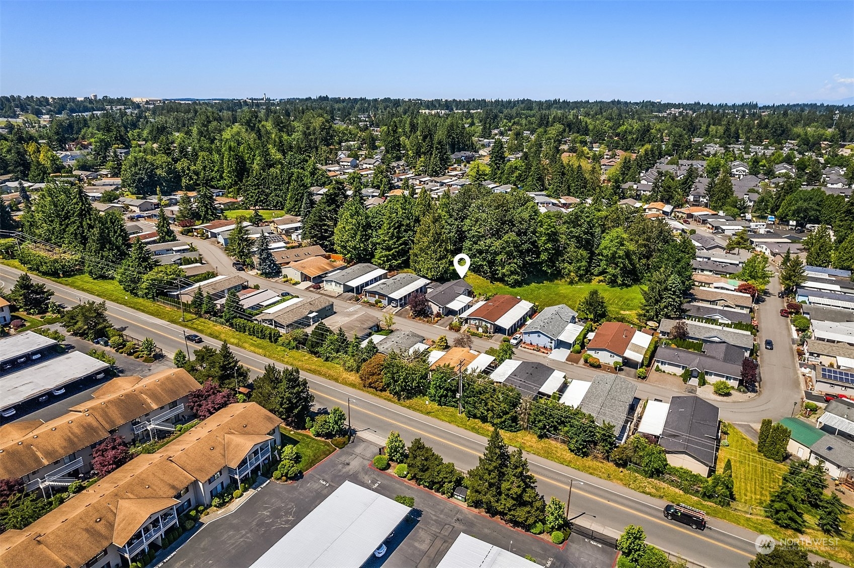 815 Southwest 124th Street, Unit 149 Everett, WA 98204 - Photo 33 of 35 an aerial view of residential houses with outdoor space and street view