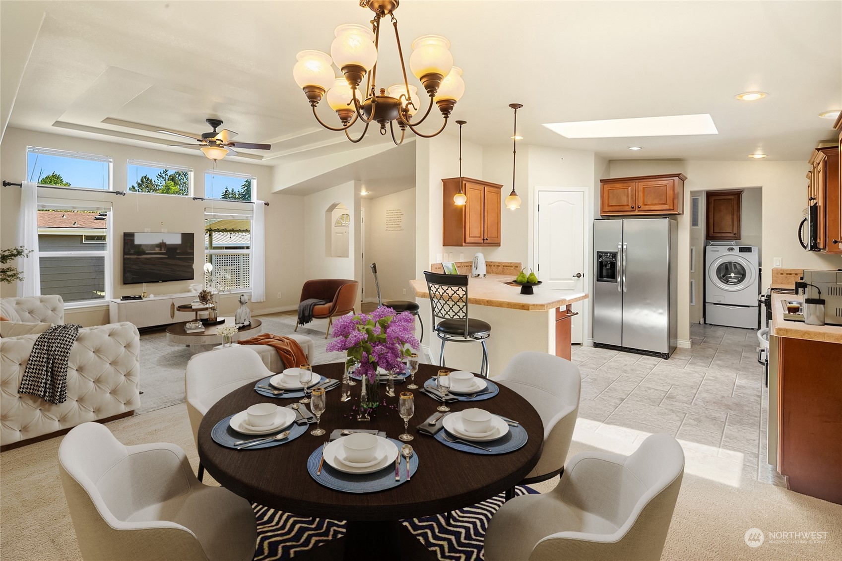 815 Southwest 124th Street, Unit 149 Everett, WA 98204 - Photo 7 of 35 a open dining room with furniture a chandelier and kitchen view
