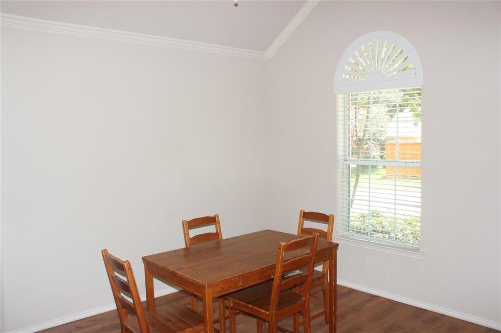 8313 Fountain Ridge Drive Plano, TX 75025 - Photo 2 of 24 a view of a workspace with furniture and a window