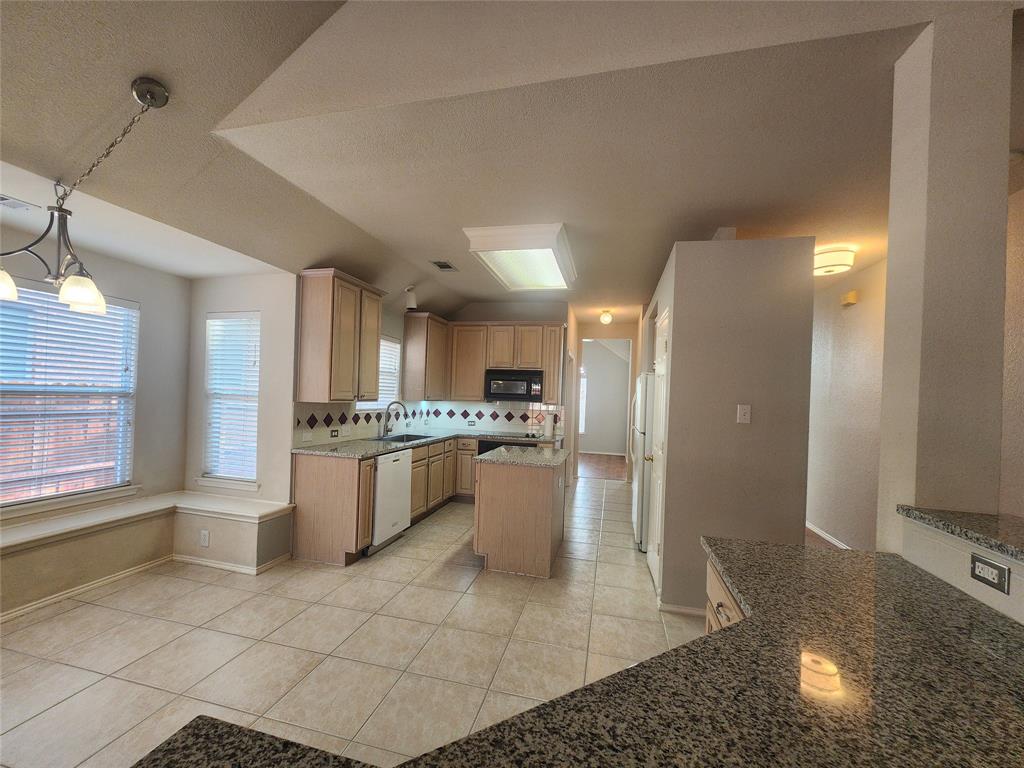 8313 Fountain Ridge Drive Plano, TX 75025 - Photo 21 of 24 a large bathroom with a large mirror vanity and shower