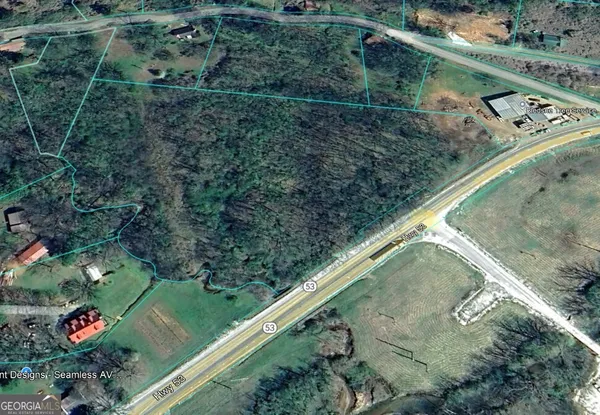 a view of a yard with a lake