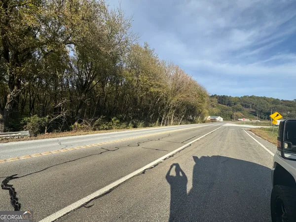 a view of a city street from a balcony