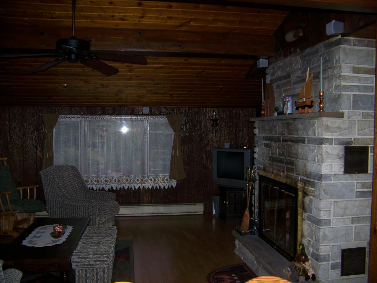 74 Mountain Road Albrightsville, PA 18210 - Photo 3 of 8 a room with furniture and a fireplace