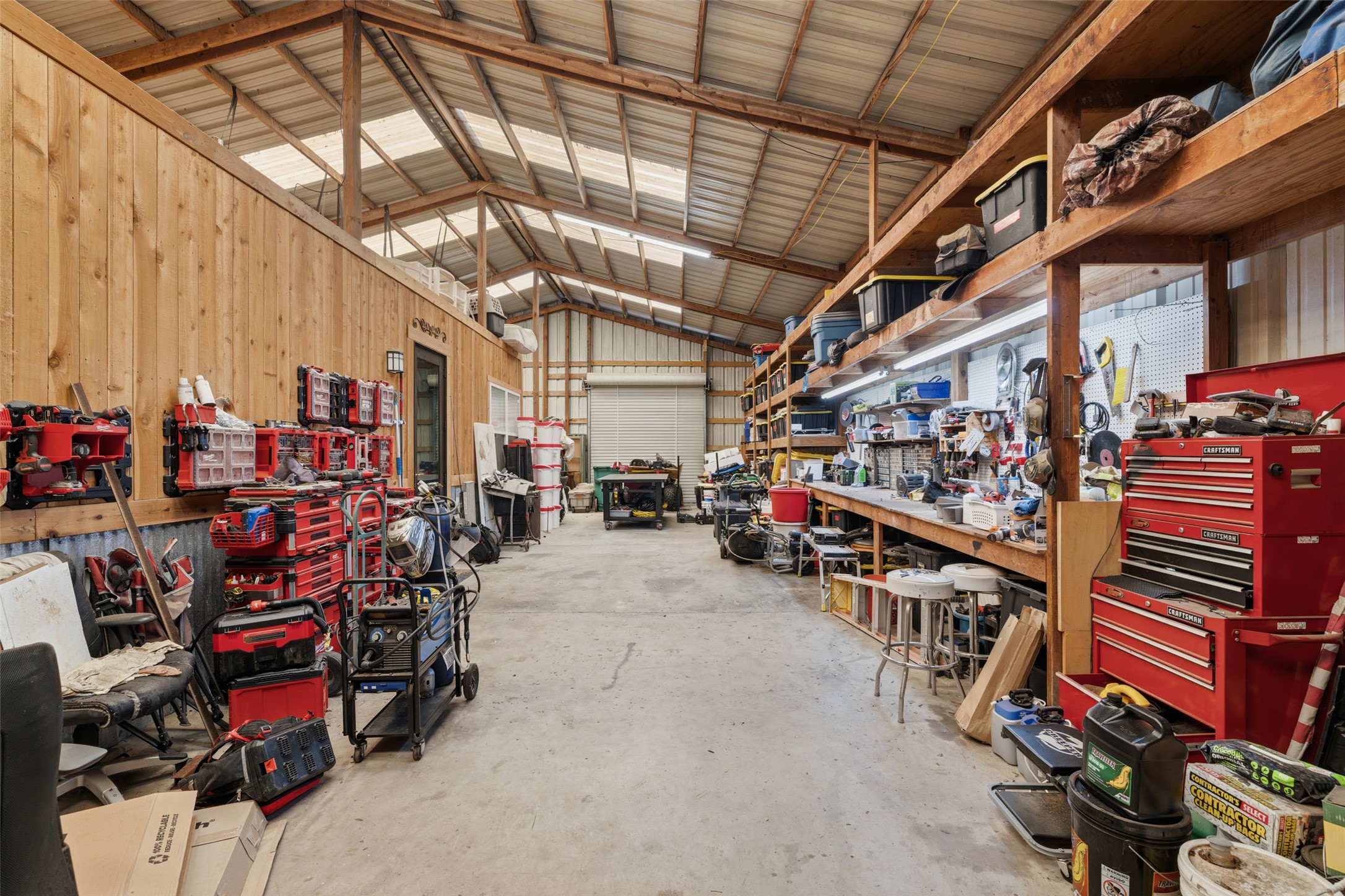 764 Stubbs Road Johnson City, TX 78636 - Photo 9 of 29 Ample workshop space and storage, ideal for all your projects.