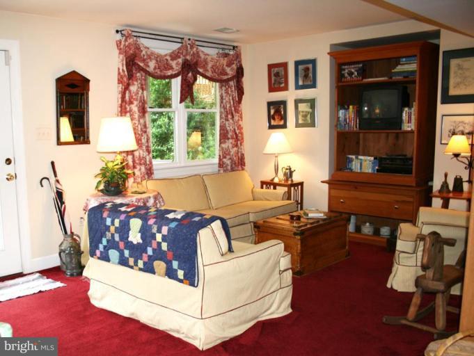 421 Tschiffely Square Road Gaithersburg, MD 20878 - Photo 22 of 30 Daylight recreation room w/door to back yard