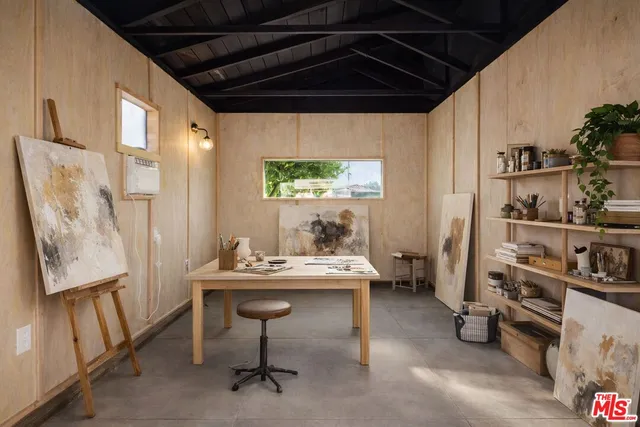 a room with furniture a window and a table