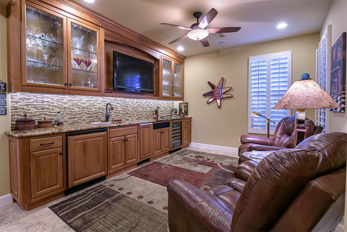 16768 West Berkeley Road Goodyear, AZ 85395 - Photo 18 of 34 TV room w/ built in bar