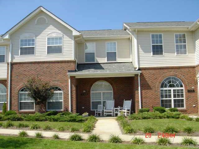 2111-103 Piney Brook Road Raleigh, NC 27614 - Photo 1 of 1 a front view of a house with garden