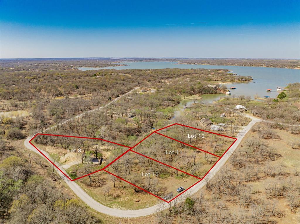 1969 Casino Road Nocona, TX 76255 - Photo 6 of 8 an aerial view of residential houses with outdoor space