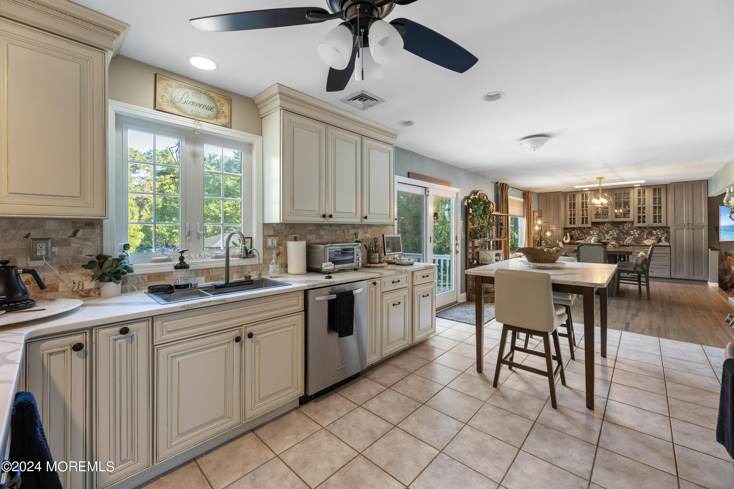 159 Arnold Boulevard Howell, NJ 07731 - Photo 15 of 60 a kitchen with sink cabinets and window