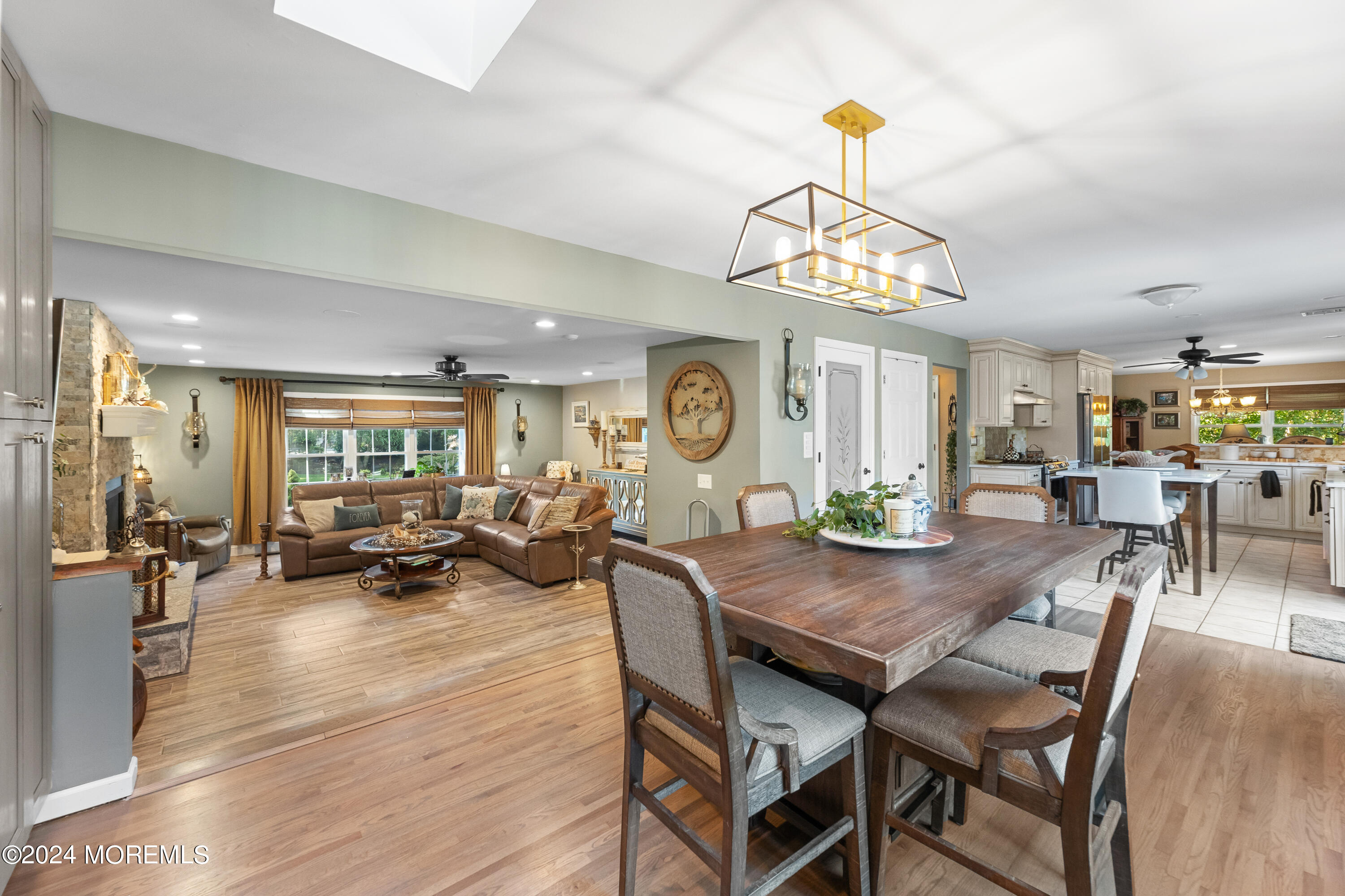 159 Arnold Boulevard Howell, NJ 07731 - Photo 21 of 60 a view of a dining room with furniture wooden floor and chandelier