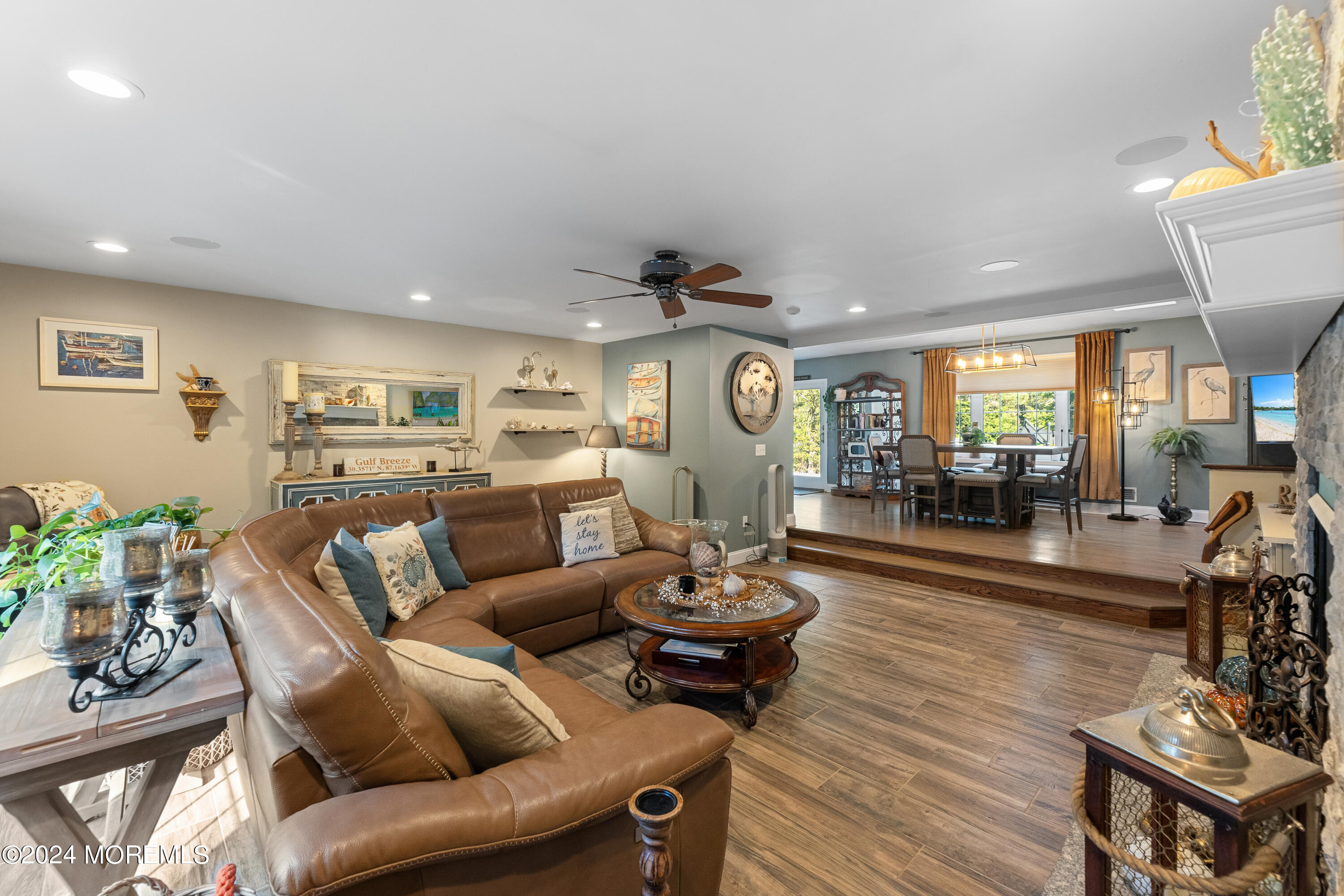 159 Arnold Boulevard Howell, NJ 07731 - Photo 24 of 60 a living room with furniture and a wooden floor