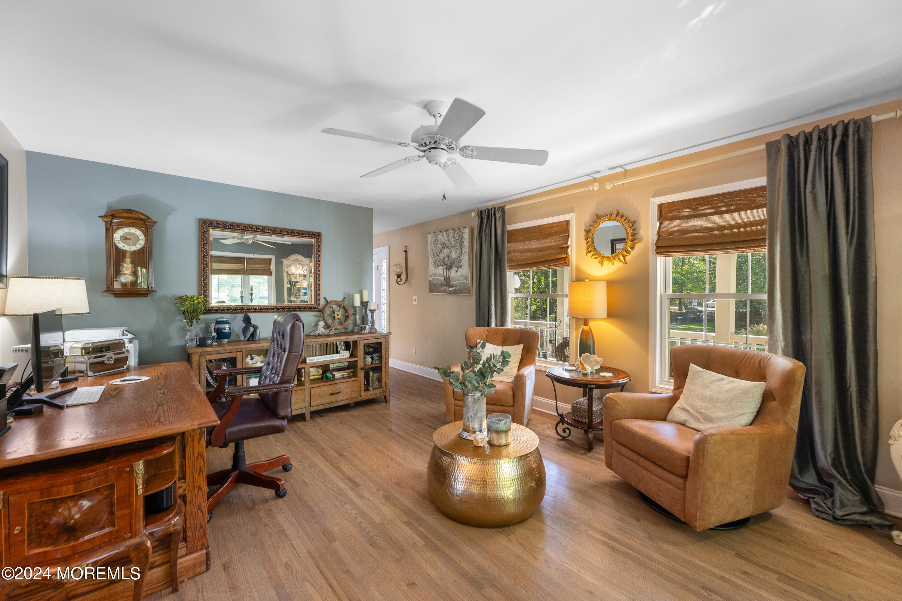 159 Arnold Boulevard Howell, NJ 07731 - Photo 26 of 60 a living room with furniture and wooden floor