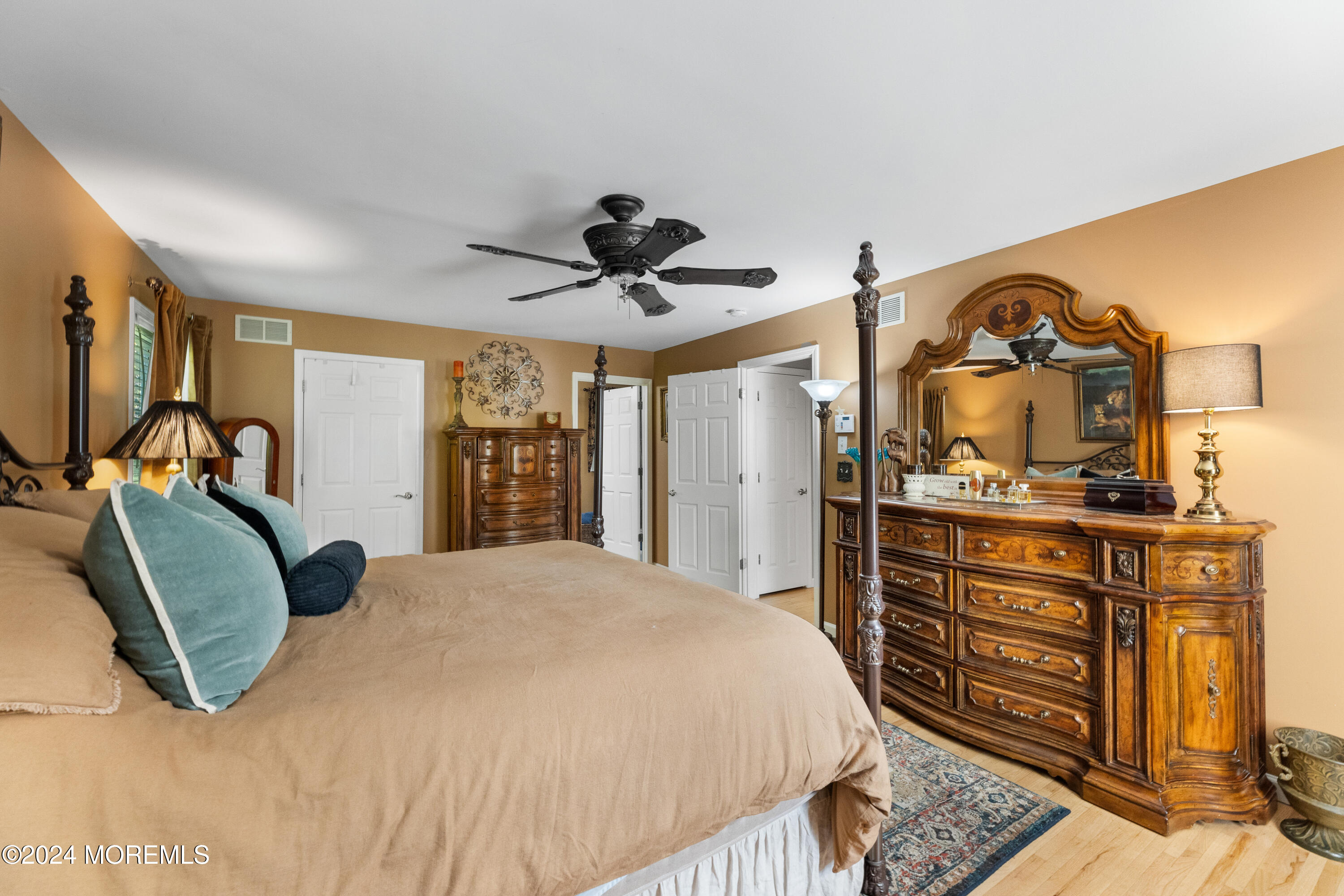 159 Arnold Boulevard Howell, NJ 07731 - Photo 29 of 60 a bedroom with a bed and a dresser