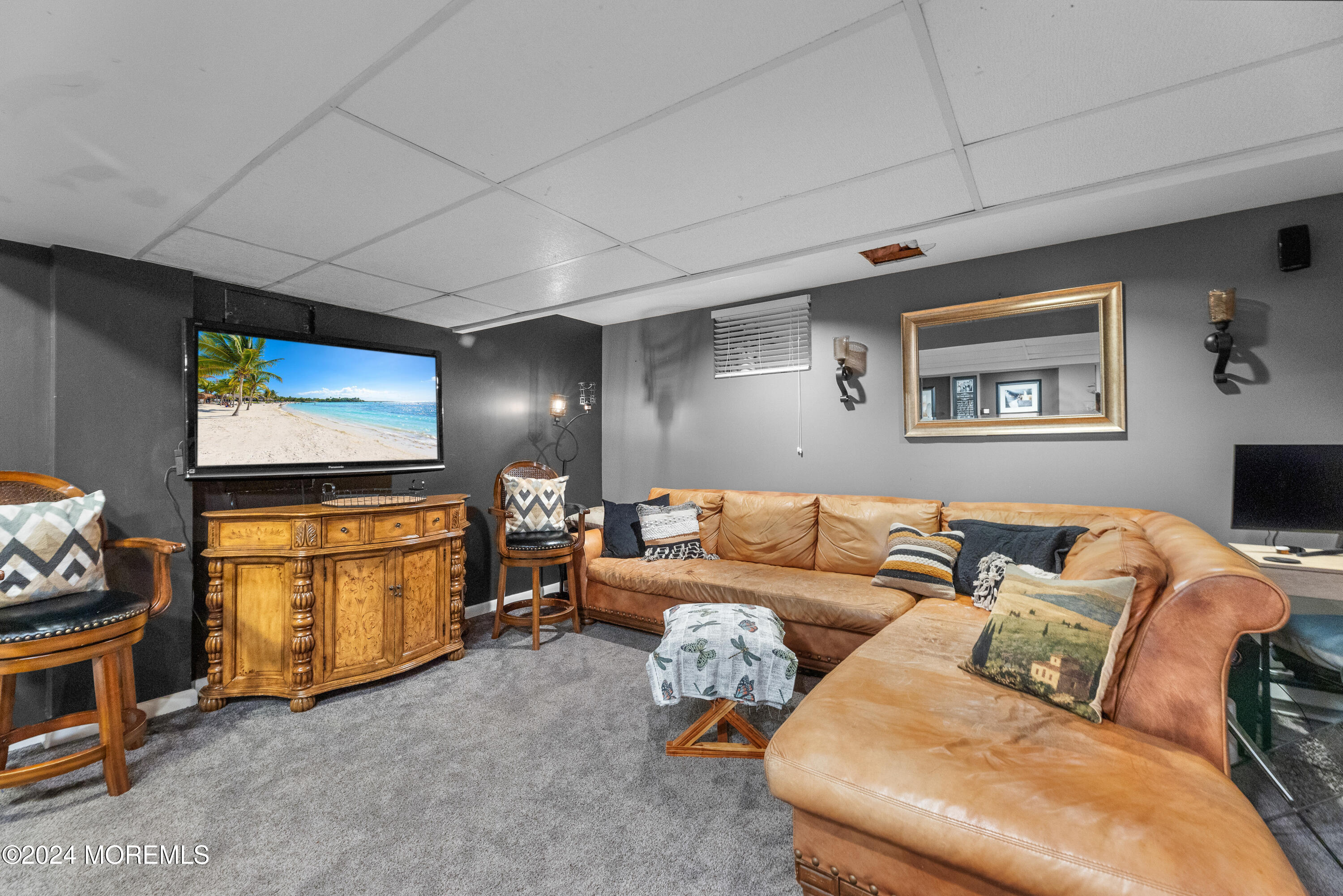 159 Arnold Boulevard Howell, NJ 07731 - Photo 38 of 60 a living room with furniture and a flat screen tv