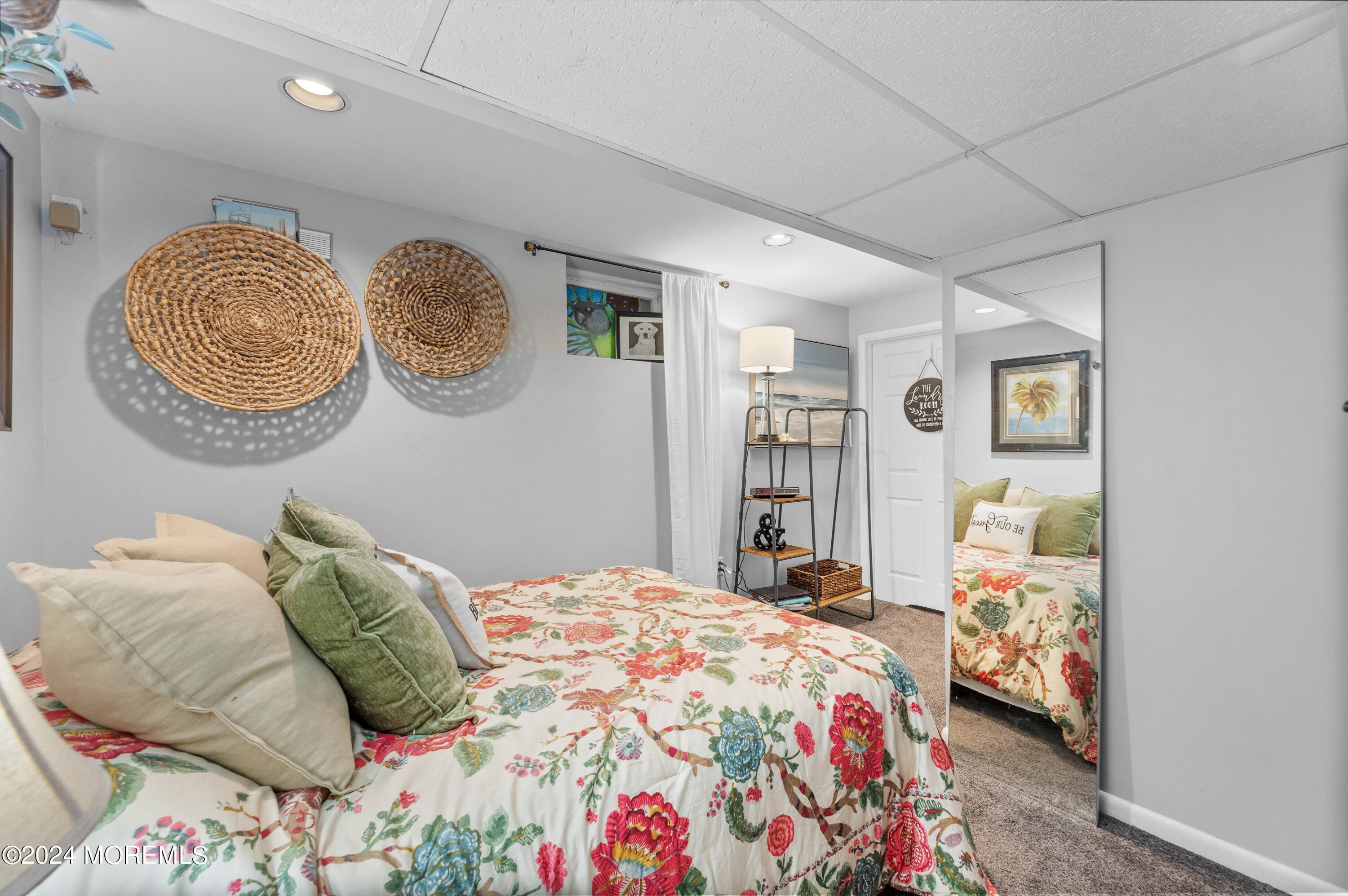 159 Arnold Boulevard Howell, NJ 07731 - Photo 41 of 60 a bedroom with a bed and painting on the wall