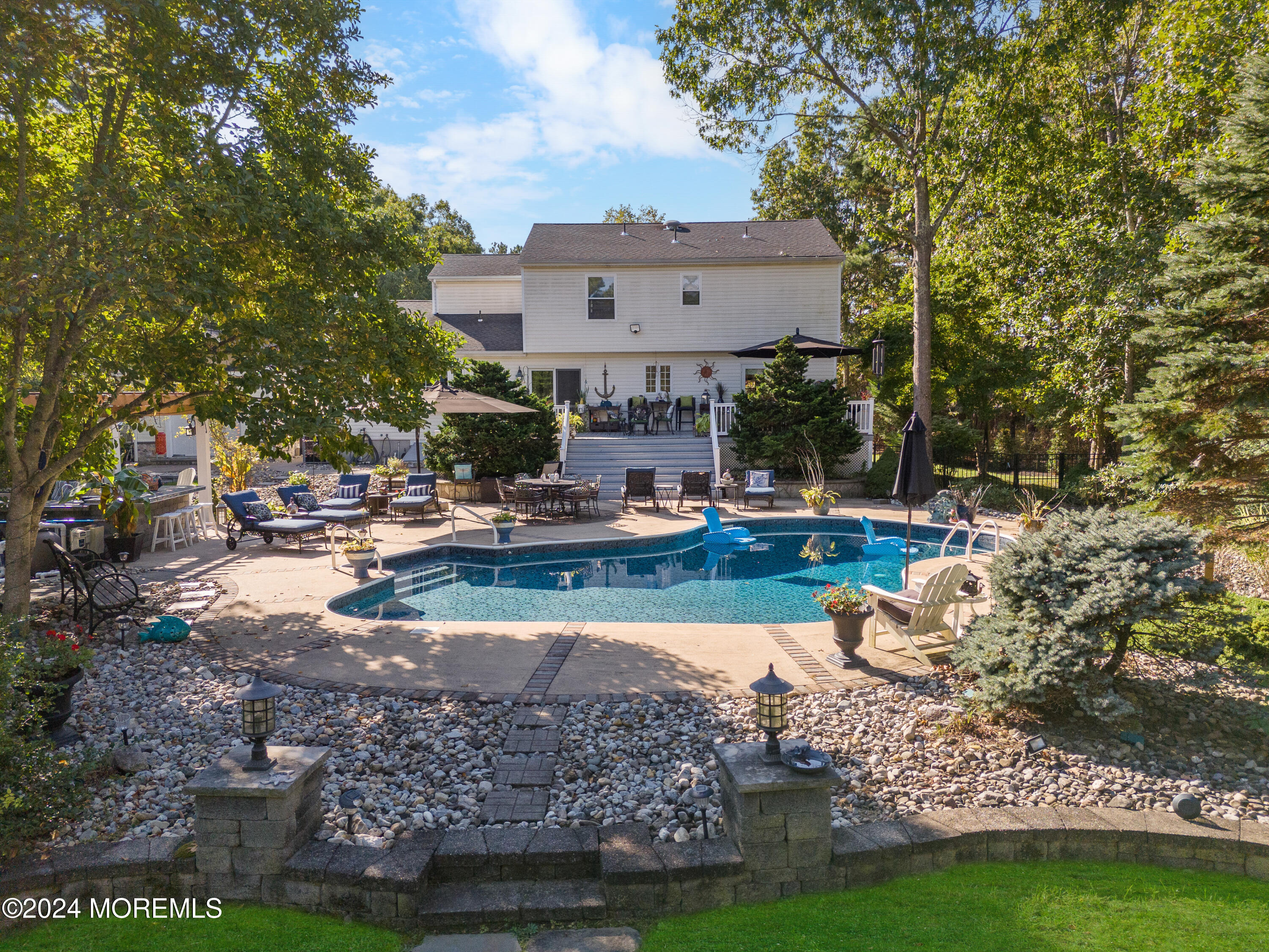 159 Arnold Boulevard Howell, NJ 07731 - Photo 46 of 60 a view of a house with a yard and sitting area