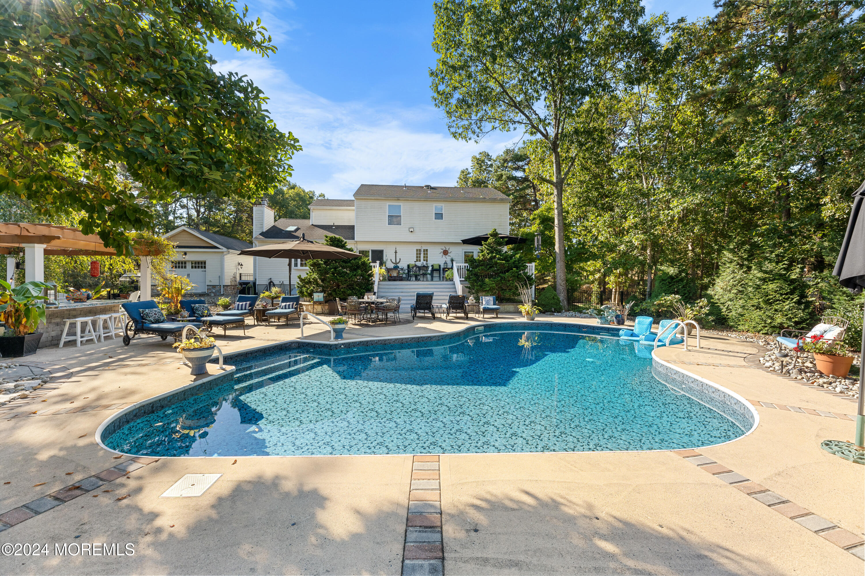 159 Arnold Boulevard Howell, NJ 07731 - Photo 48 of 60 a view of a swimming pool with outdoor seating