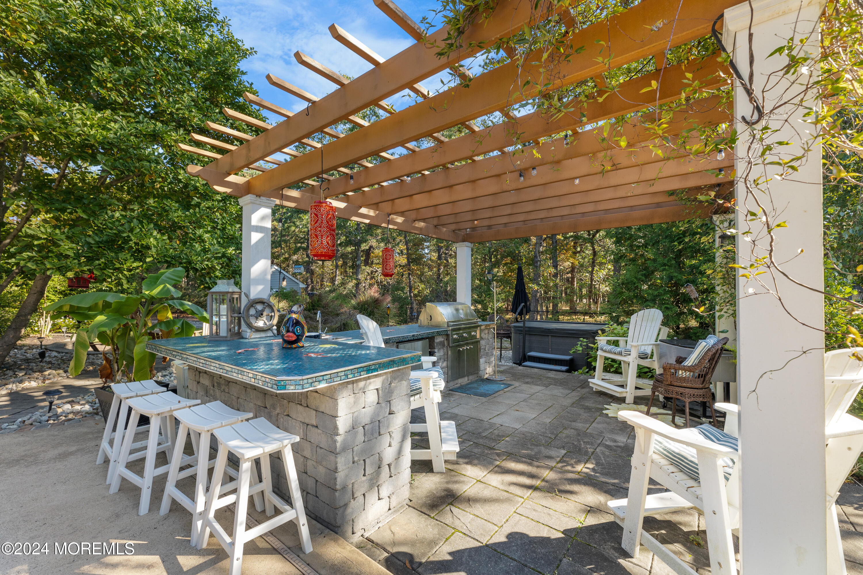 159 Arnold Boulevard Howell, NJ 07731 - Photo 50 of 60 a view of a patio with table and chairs and potted plants
