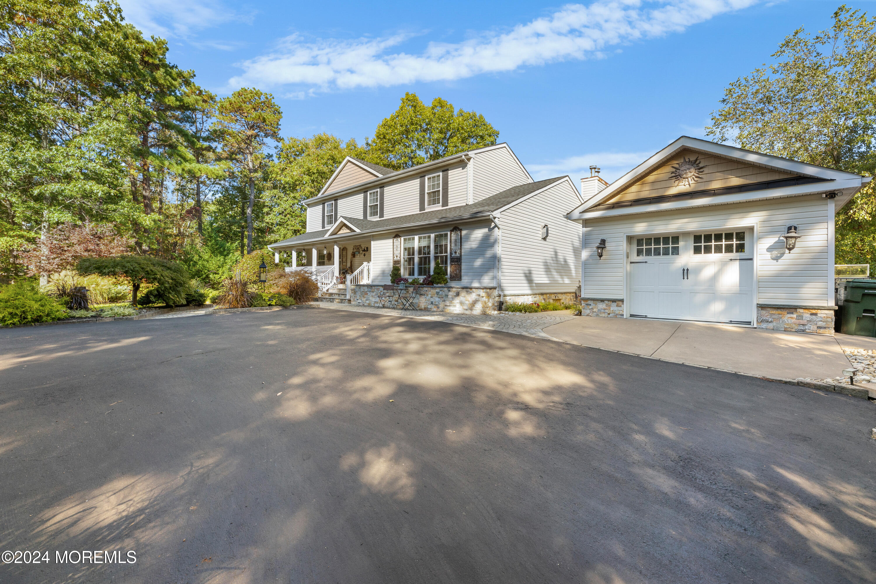 159 Arnold Boulevard Howell, NJ 07731 - Photo 5 of 60 a front view of a house with a yard