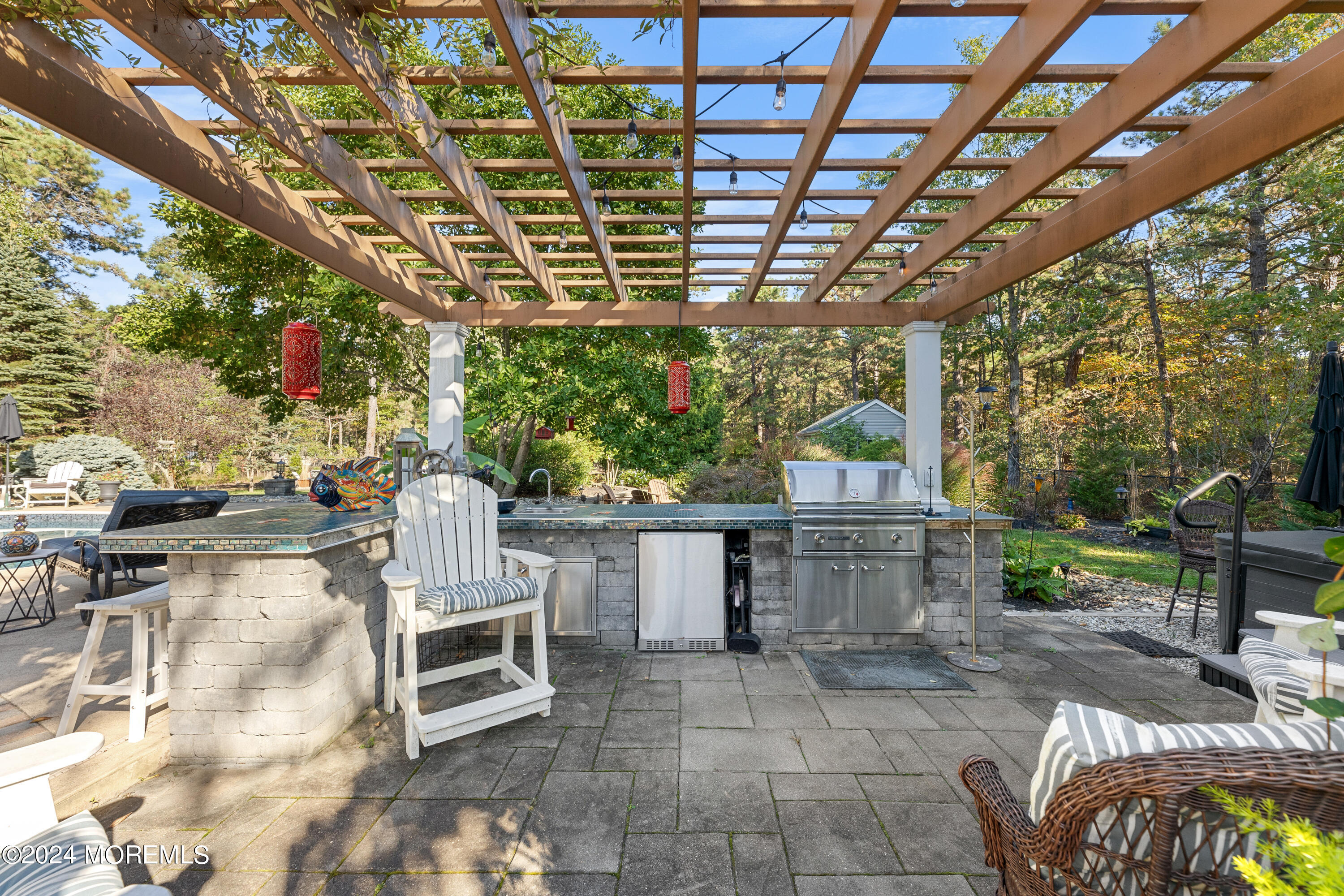 159 Arnold Boulevard Howell, NJ 07731 - Photo 51 of 60 a view of a chairs and table in the patio
