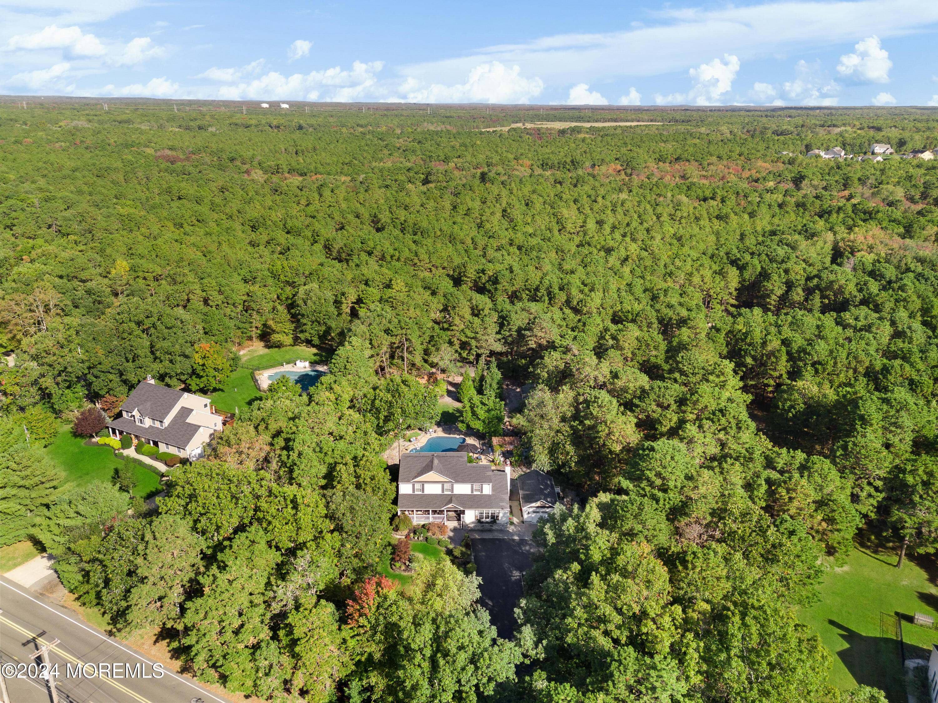 159 Arnold Boulevard Howell, NJ 07731 - Photo 9 of 60 an aerial view of residential houses with outdoor space and trees