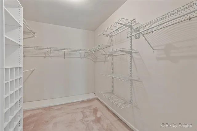 a view of a room with racks on the wall