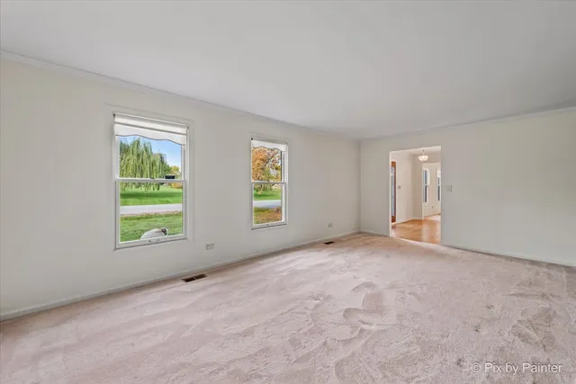 an empty room with windows