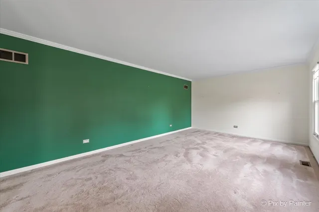 a view of a big room with a fan